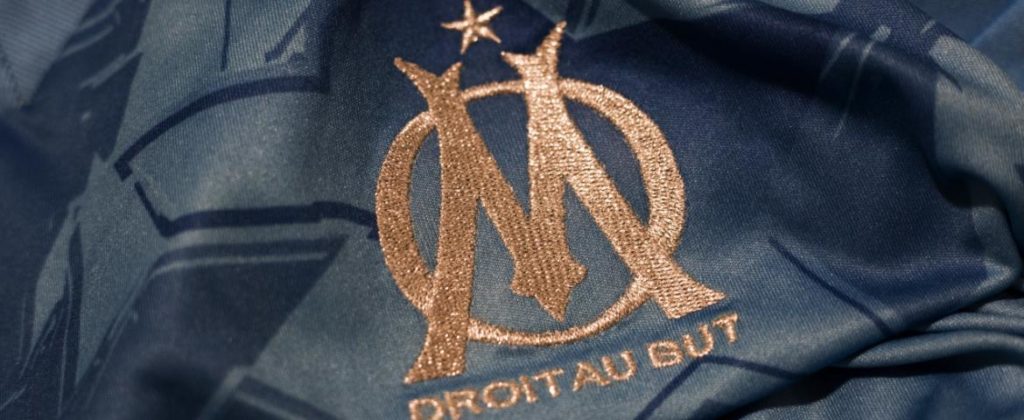 Logo OM